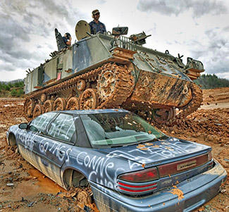 Tank Driving Over A Car