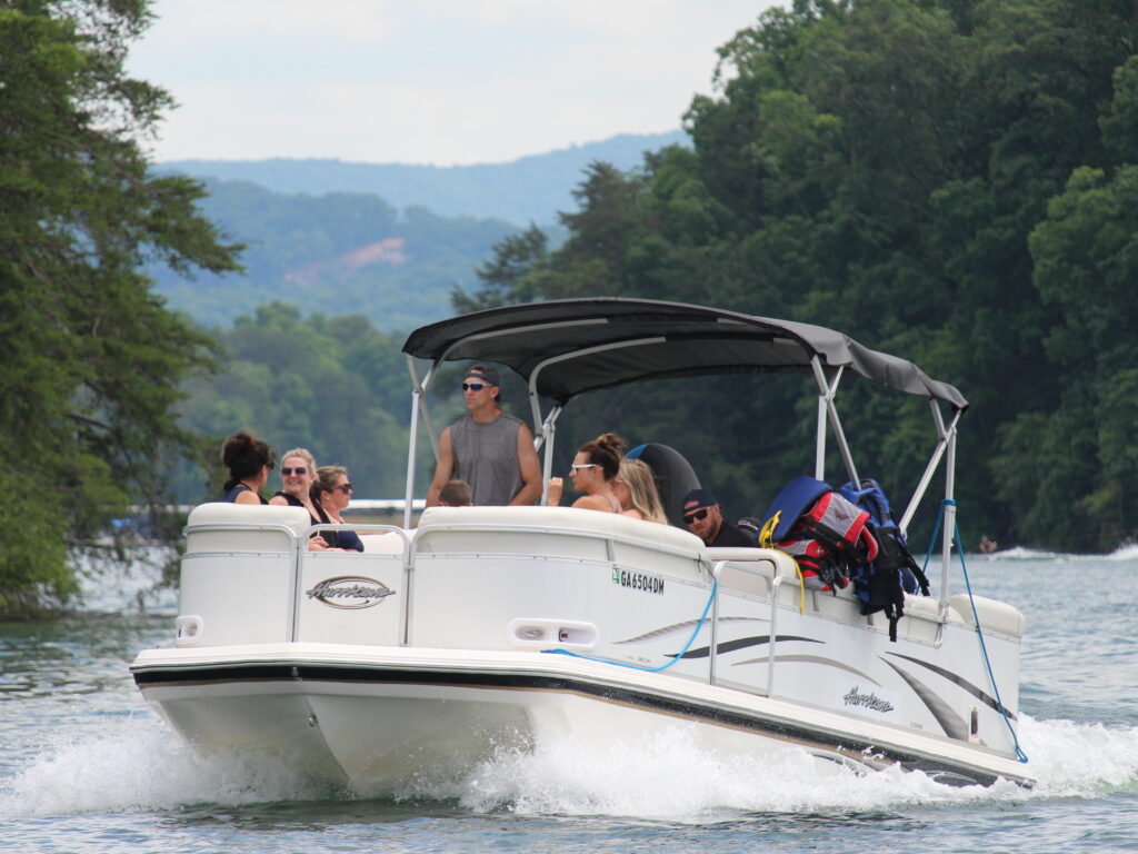 People on a Hurricane Deck Boat on Lake Blue Ridge